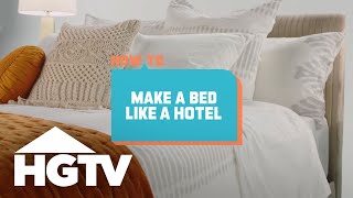 How to House How to Make a Bed Like a Hotel  HGTV [upl. by Afesoj]