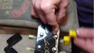 Master Luthiers Guitar String Winding Technique [upl. by Aliekahs]