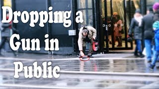 Dropping A Gun In Public Prank Social Experiment [upl. by Petta]