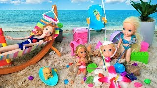 Annia and Elsia Toddlers Play in the Sand Swim at the Beach with Barbie and Chelsea Toys and Dolls [upl. by Felicia191]